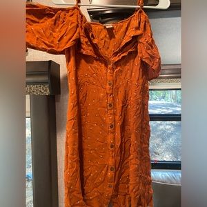 This dress is a size XL color is burnt orange